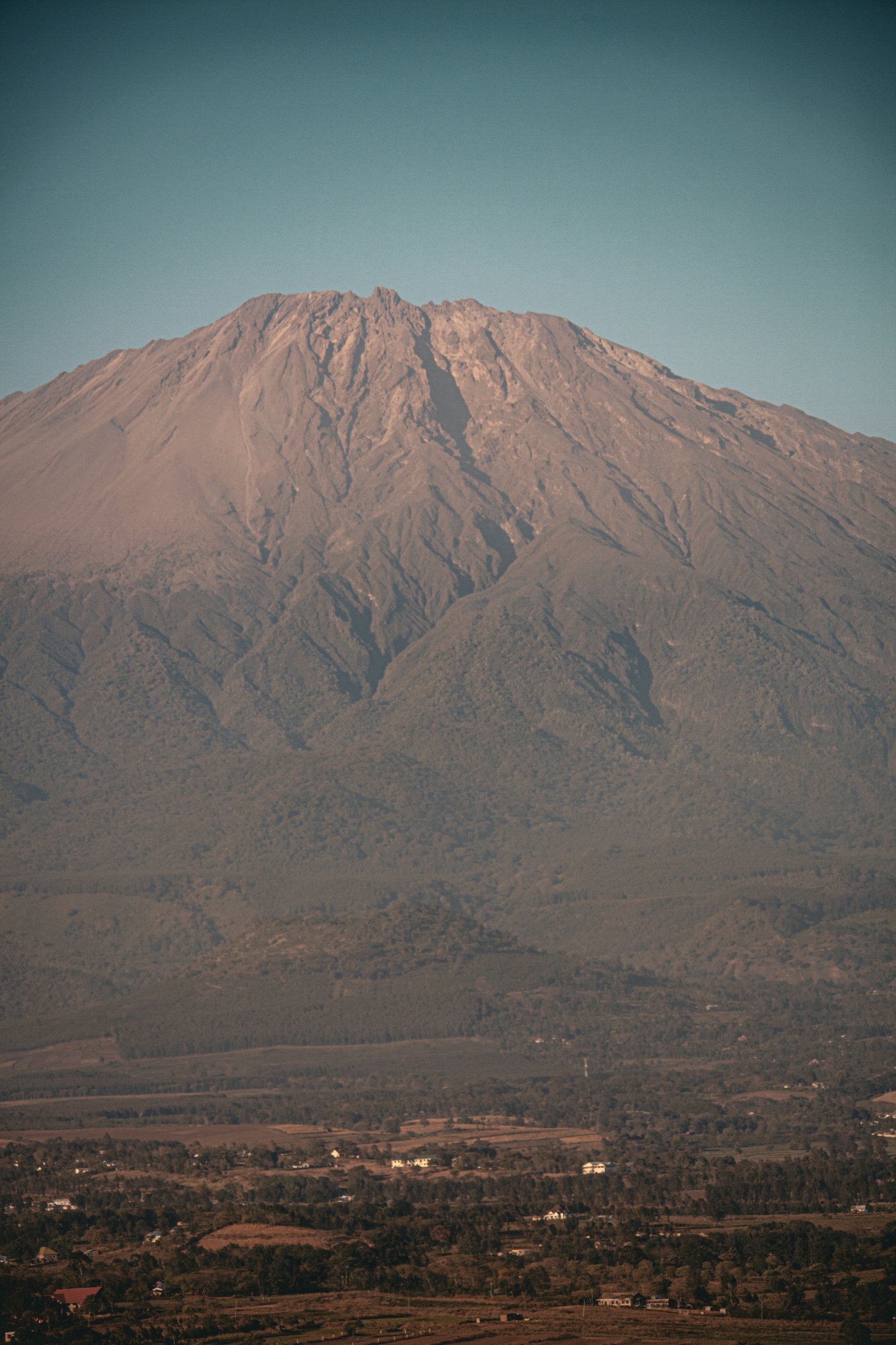 Mount Meru rising above the clouds near Arusha, Tanzania's second-highest peak