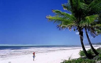 White sandy beach and turquoise waters of Zanzibar Island